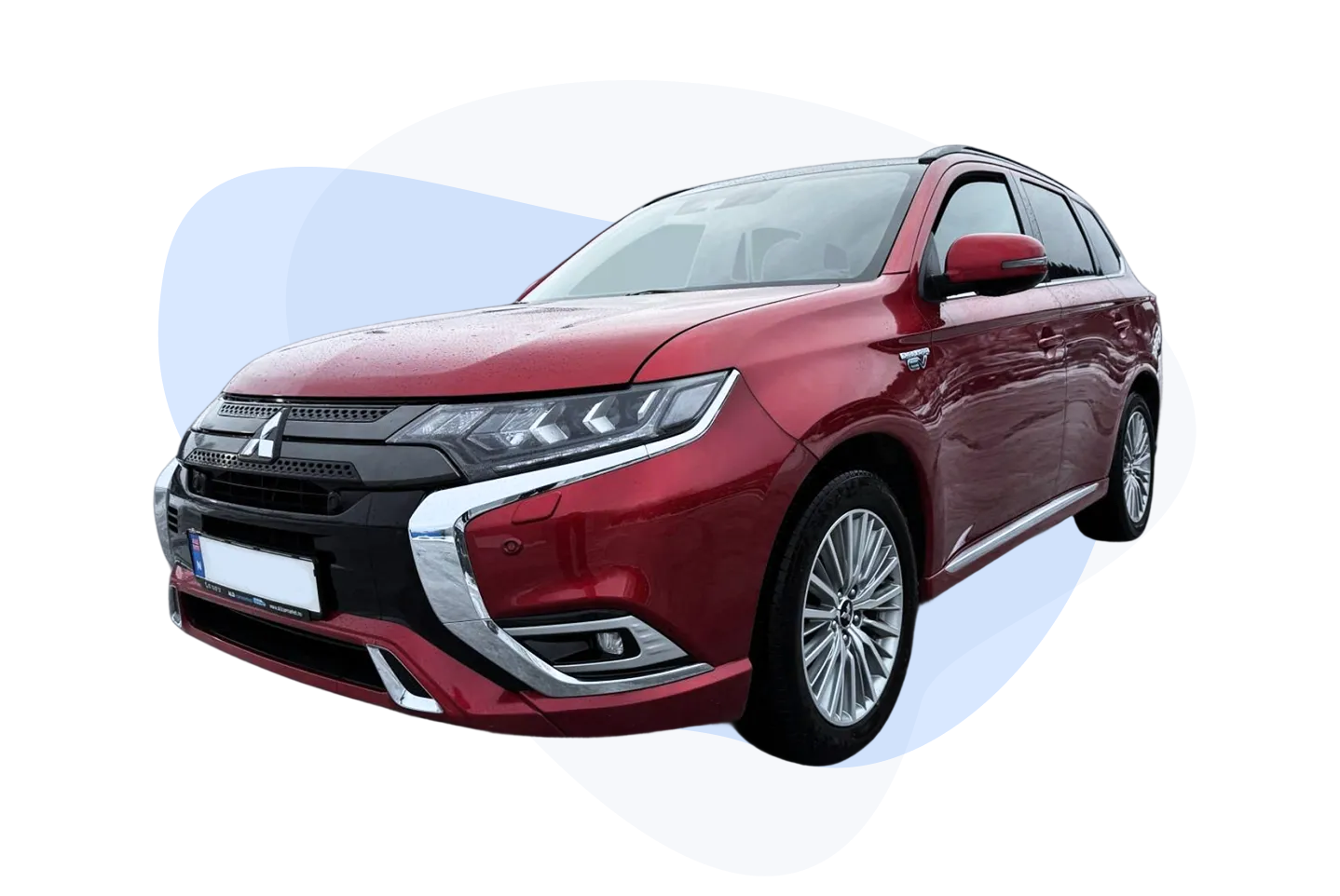 Rød Mitsubishi SUV med skinnende karosseri og stilfulle aluminiumsfelger mot en lys bakgrunn.