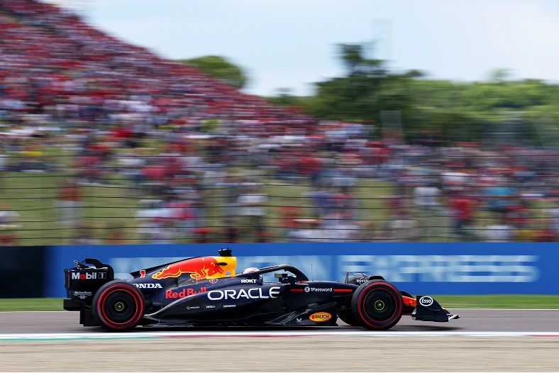 An Oracle Red Bull Racing Formula 1 car speeds around the circuit, demonstrating engineering excellence, innovation, and performance powered by data and technology.