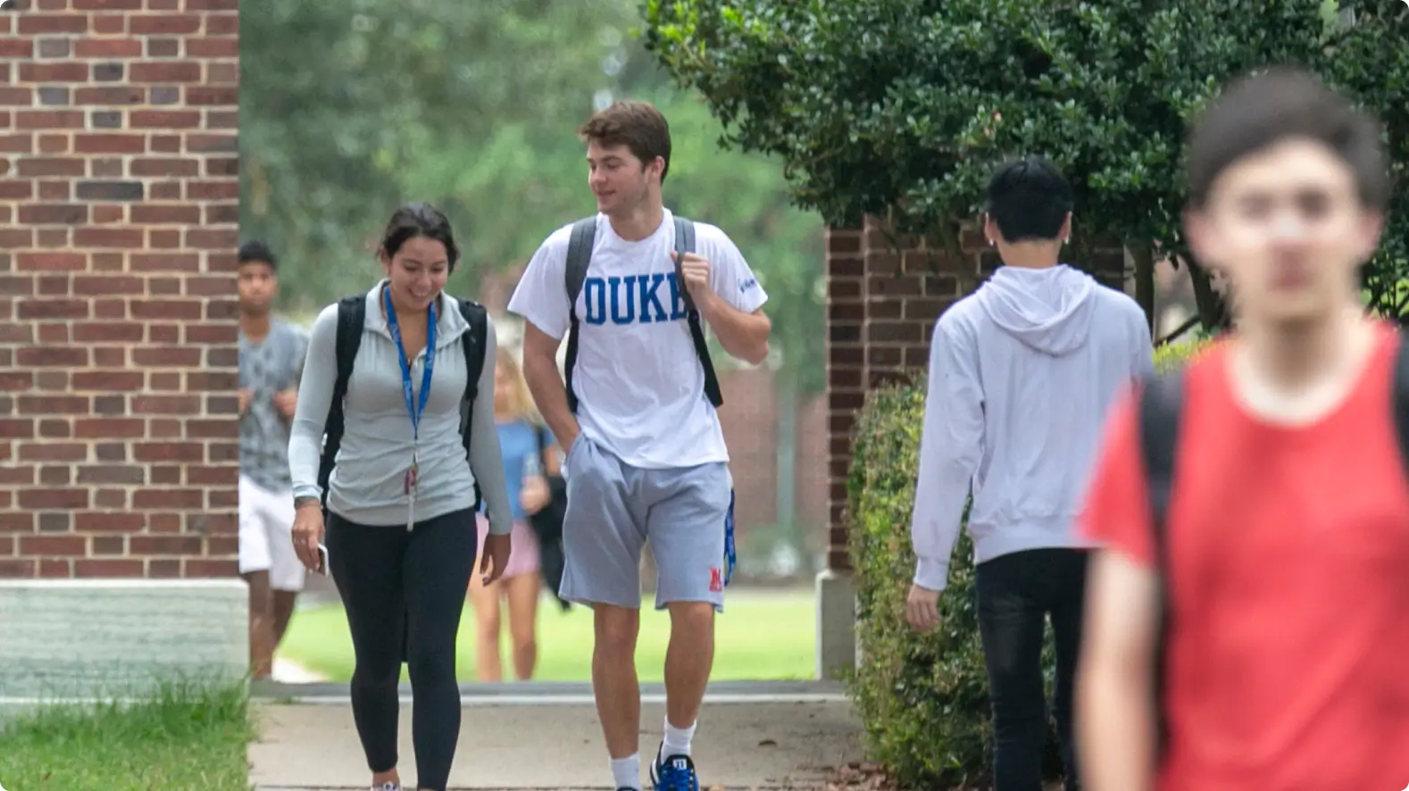 Duke students walking through campus outdoors