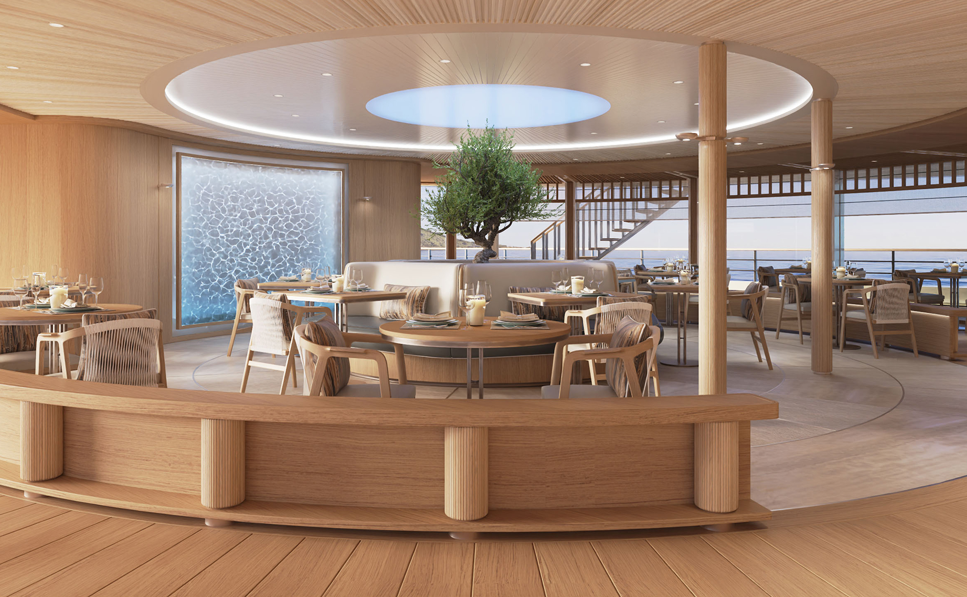 Circular ocean-view dining at Alira aboard the Amangati yacht during a luxury Mediterranean yacht voyage