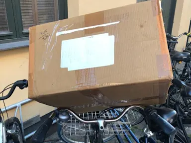 A cardboard box on a bike Holiday hoaxes How scammers take advantage of the holiday season