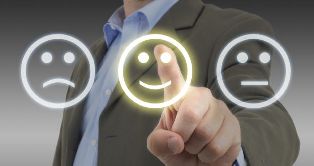 fingers-on-touchscreen-with-smileys
