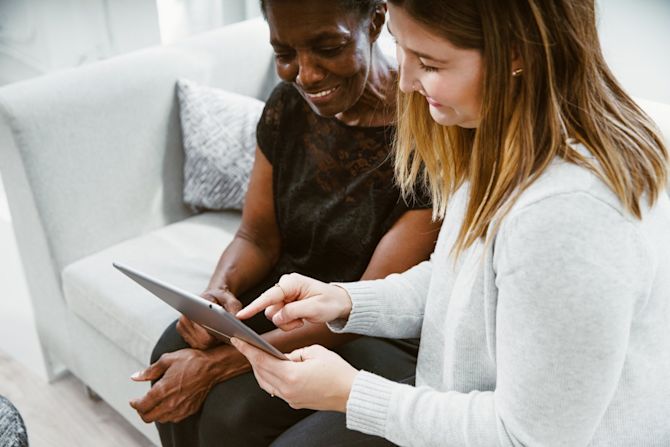 Two women on an iPad Social Proof 101: What is it, and why is it essential for eCommerce?