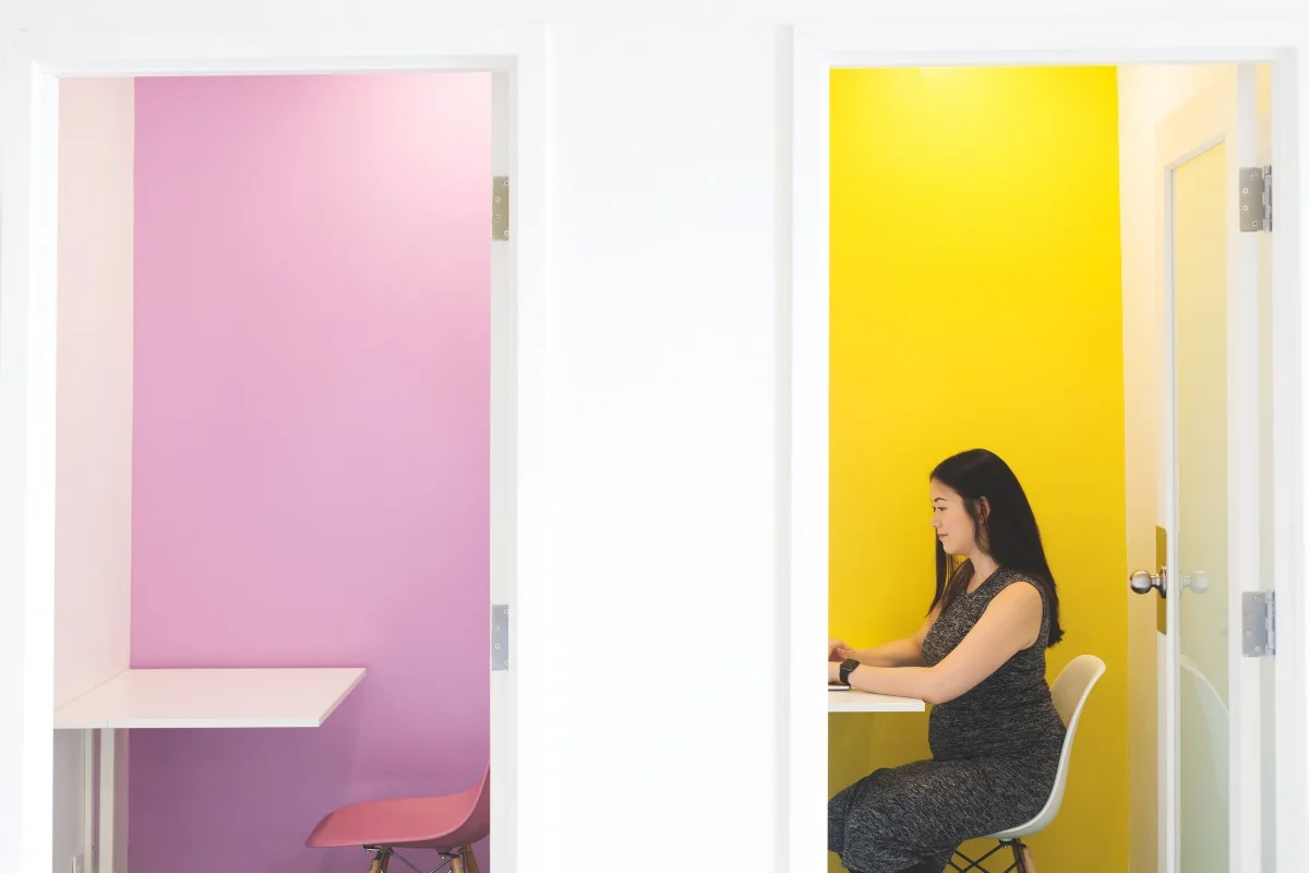 Woman sitting behind a desk ZipRecruiter Case Study Hero