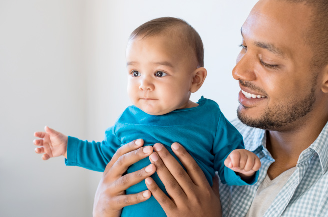 Man holding a baby