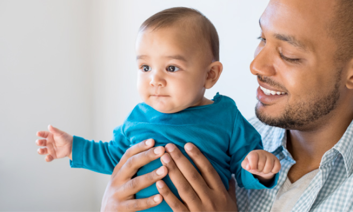 Man holding a baby