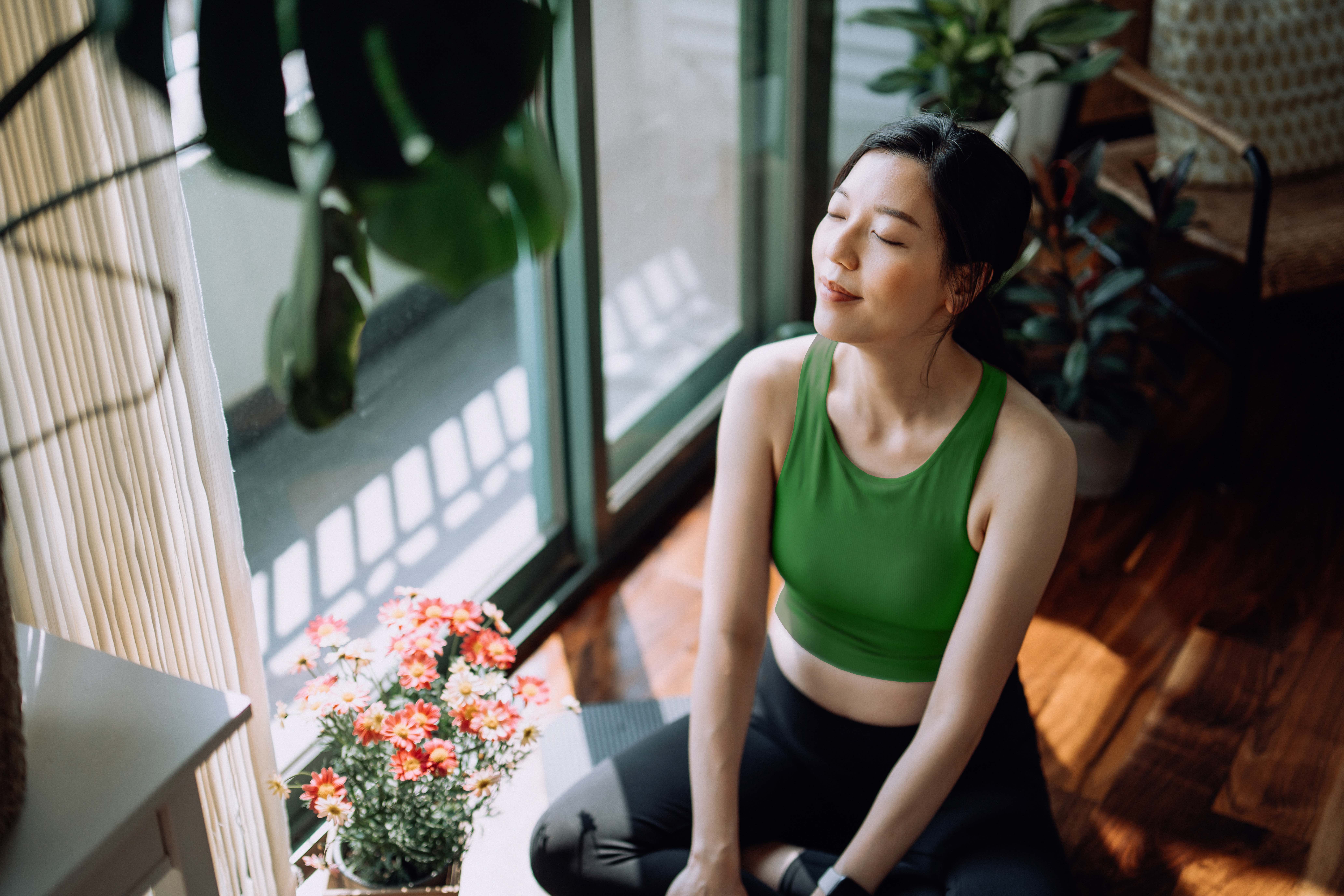 Three people doing yoga exercises