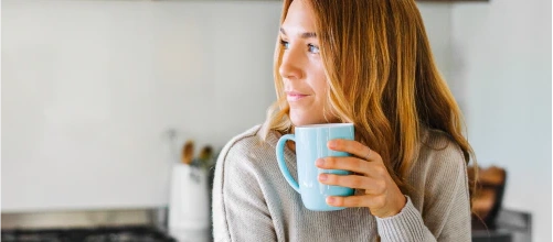 Woman holding a mug