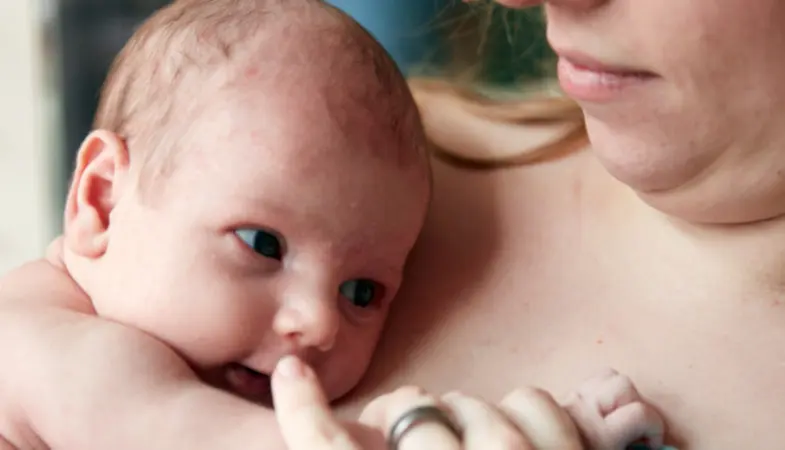 Johnson's Baby mother holding baby image