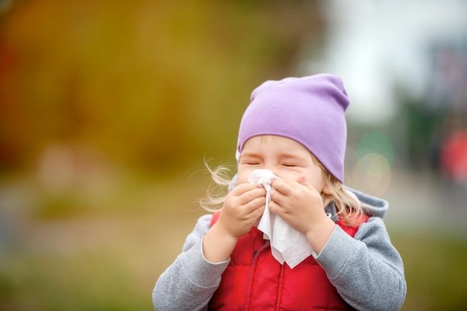 Child blowing their nose