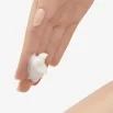 Visibly Renew Supple Touch Body Lotion texture on hand