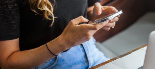 Woman looking at a mobile phone