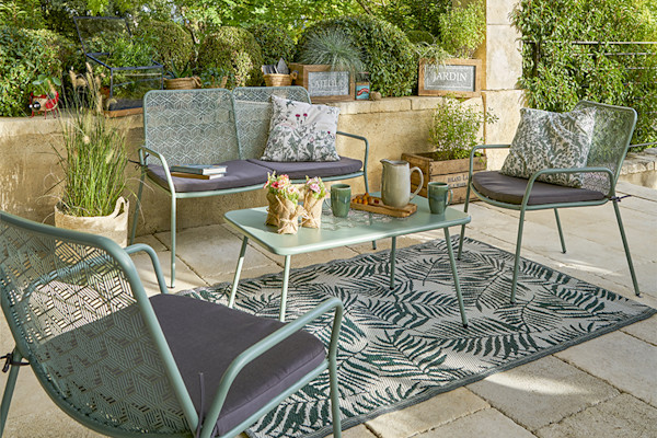 Salon de jardin en métal avec coussins gris uni et à motif floral