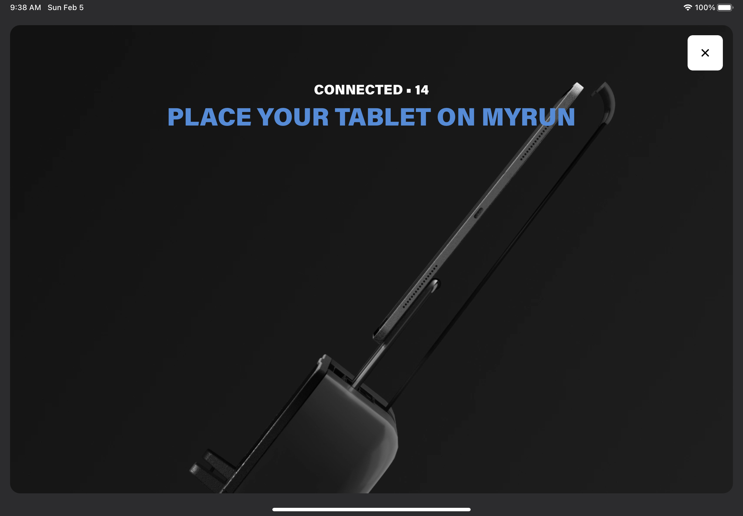 A screenshot of the Technogym Live app showing an iPad being placed on the tablet holder in the treadmill, with the text "place your tablet on MyRun," and a countdown.