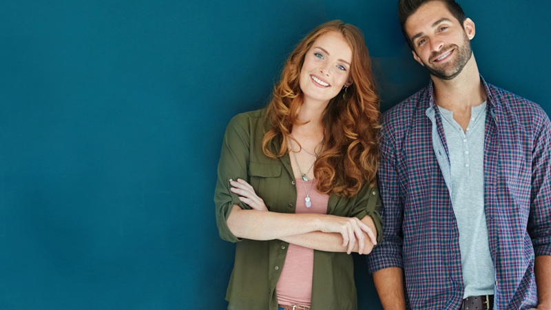 COMMON - man and woman standing near each other
