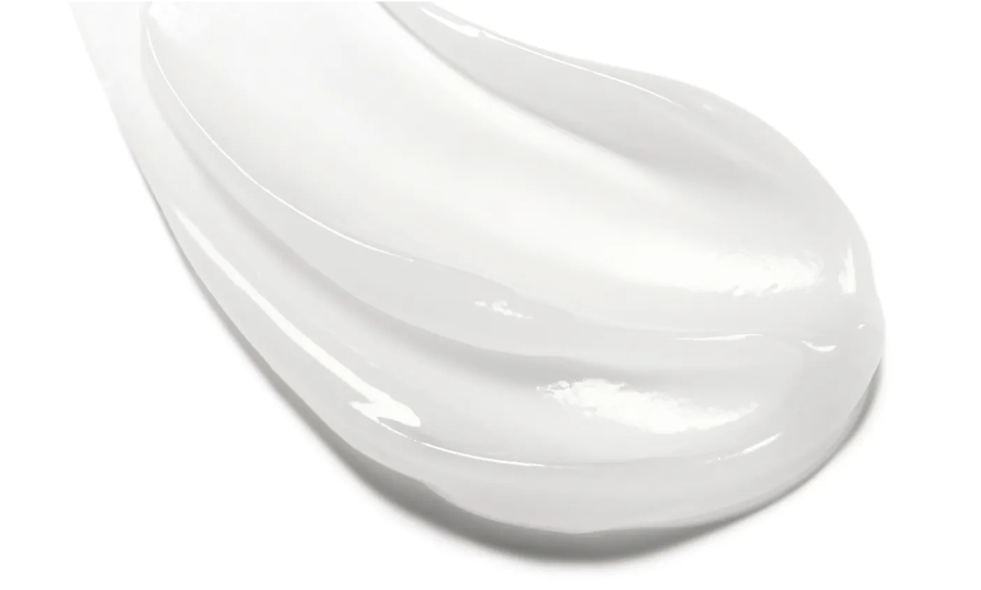 6807862-mod5-img1-20250909 A smooth, thick white cream is swatched across a white surface.