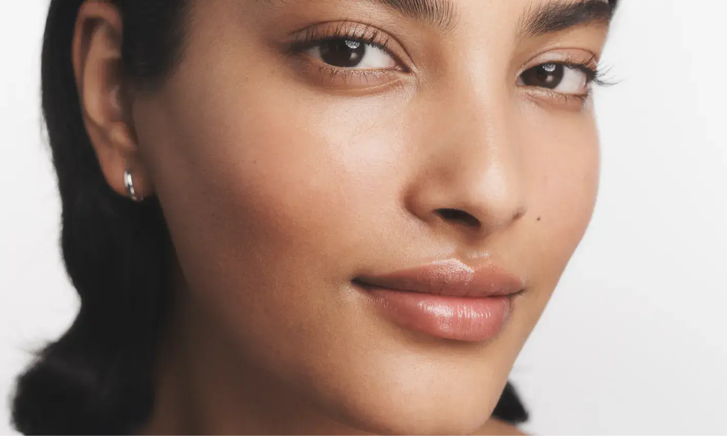 Woman with healthy skin after using Neutrogena® Hydro Boost products
