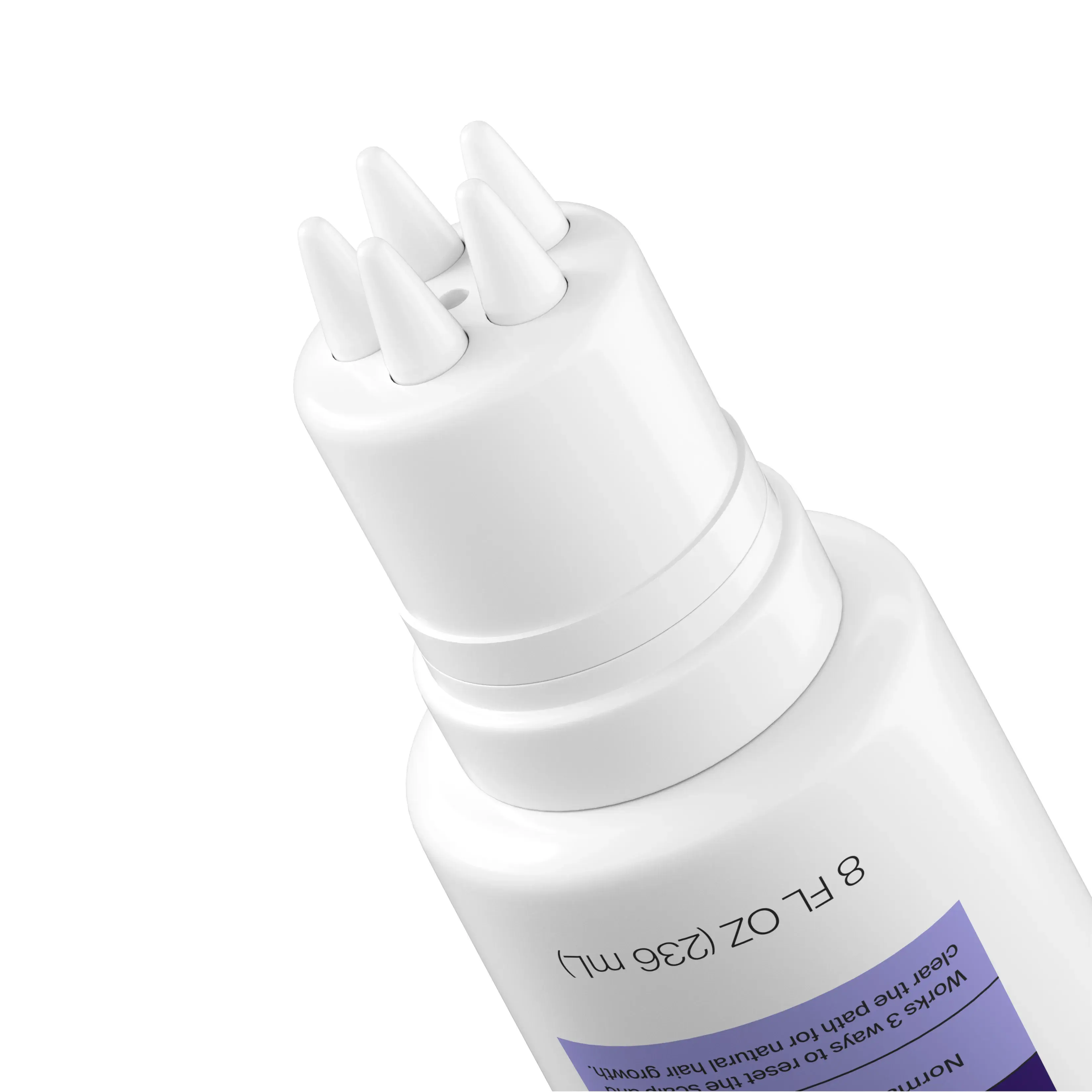 Close up of unique applicator to massage Hair Restore Triple Action Scalp Detox Cleanser directly to scalp