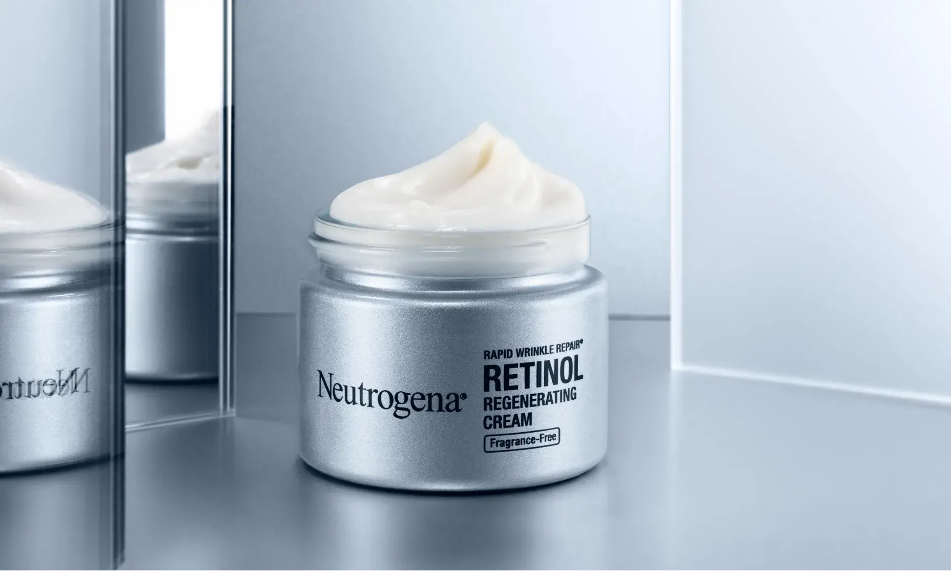 Opened Jar of Rapid Wrinkle Repair® Regenerating Retinol Cream, Fragrance-Free + Hyaluronic Acid showing texture and formula