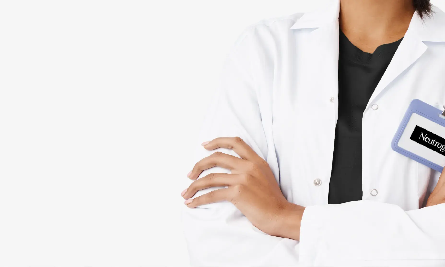 Dermatologist with a lab coat wearing a Neutrogena® tag