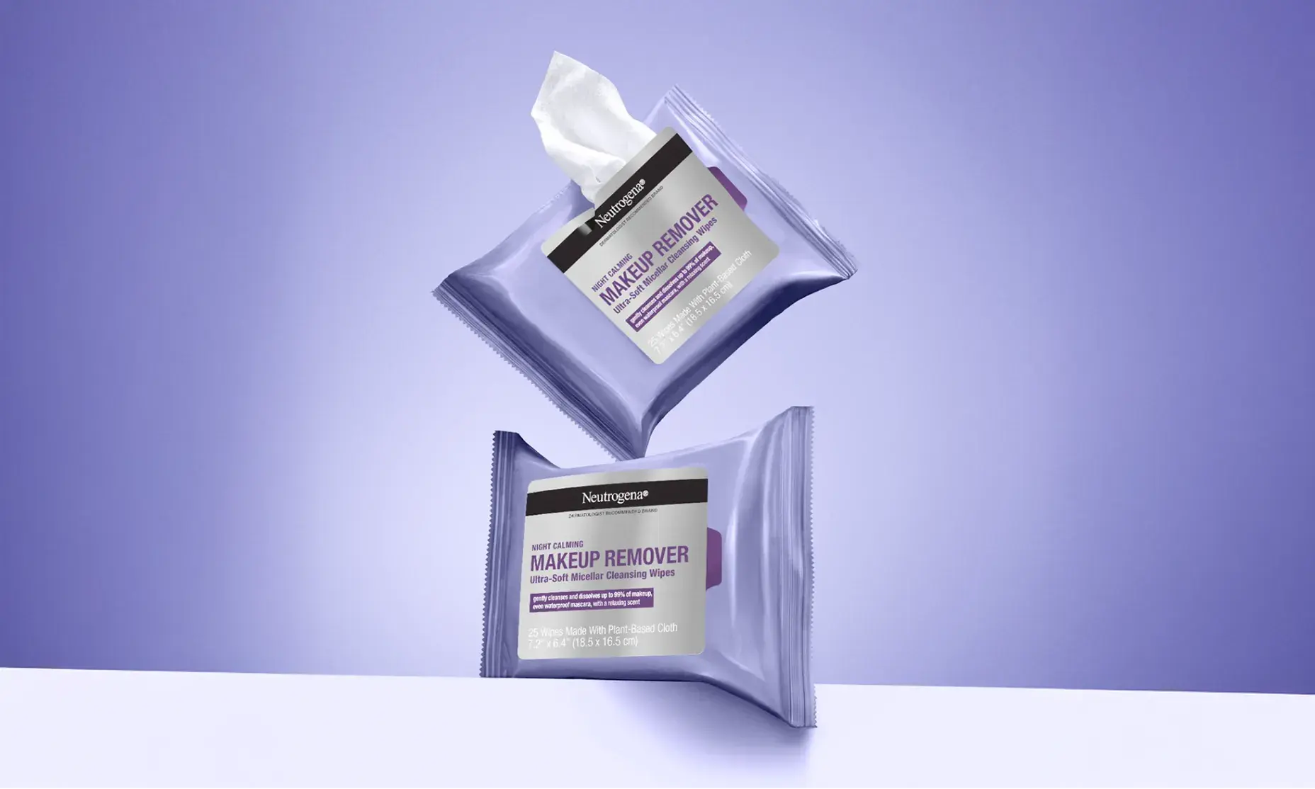 2 Wipe packages. One with a wipe removed from the packaging