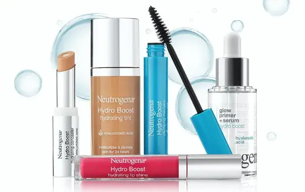 A collection of Neutrogena Hydro Boost makeup products, including a hydrating concealer, hydrating tint, mascara, lip shine, and a glow primer and serum.