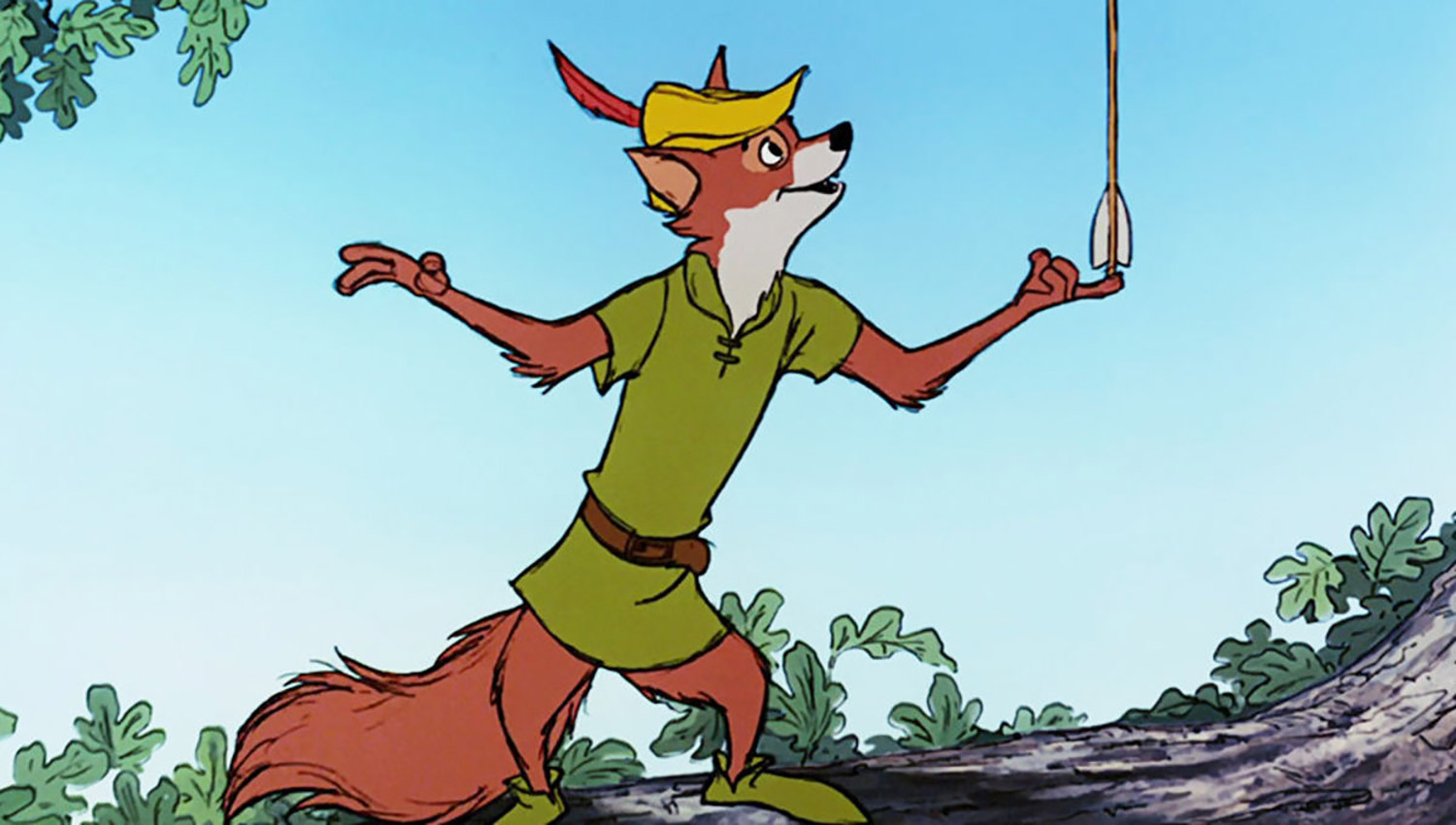 Robin Hood, a red fox with a green tunic and yellow hat with a red feather, and green slippers, stands on a tree branch, balances an arrow with white fletching feathers on his finger.