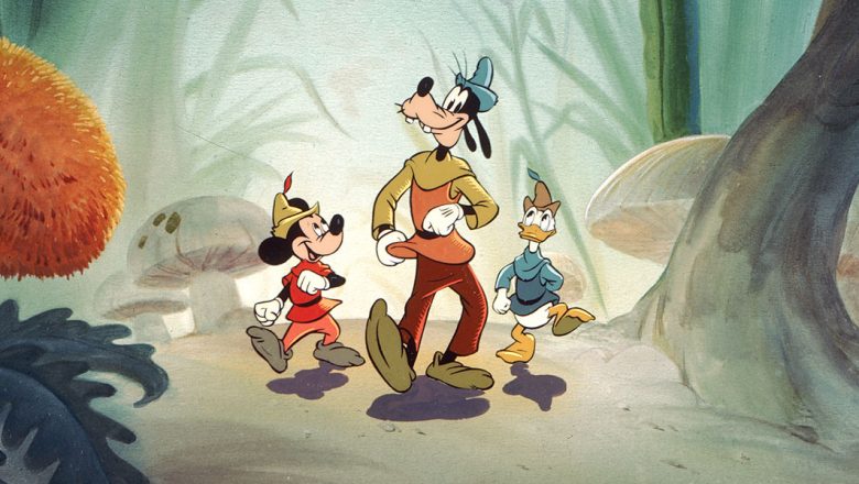 Mickey Mouse, a mouse with a tan face and black ears and body, wearing a tan hat, red tunic, orange leggings, and tan shoes, is walking. Next to him is Goofy, a dog with similar coloration, wearing a blue hat, a yellow and orange tunic, brown pants, and tan shoes.  Next to Goofy is Donald Duck, a white duck with a tan hat, blue tunic, and no pants or shoes.  They're walking through a field with mushrooms and tall grass that is taller than they are.