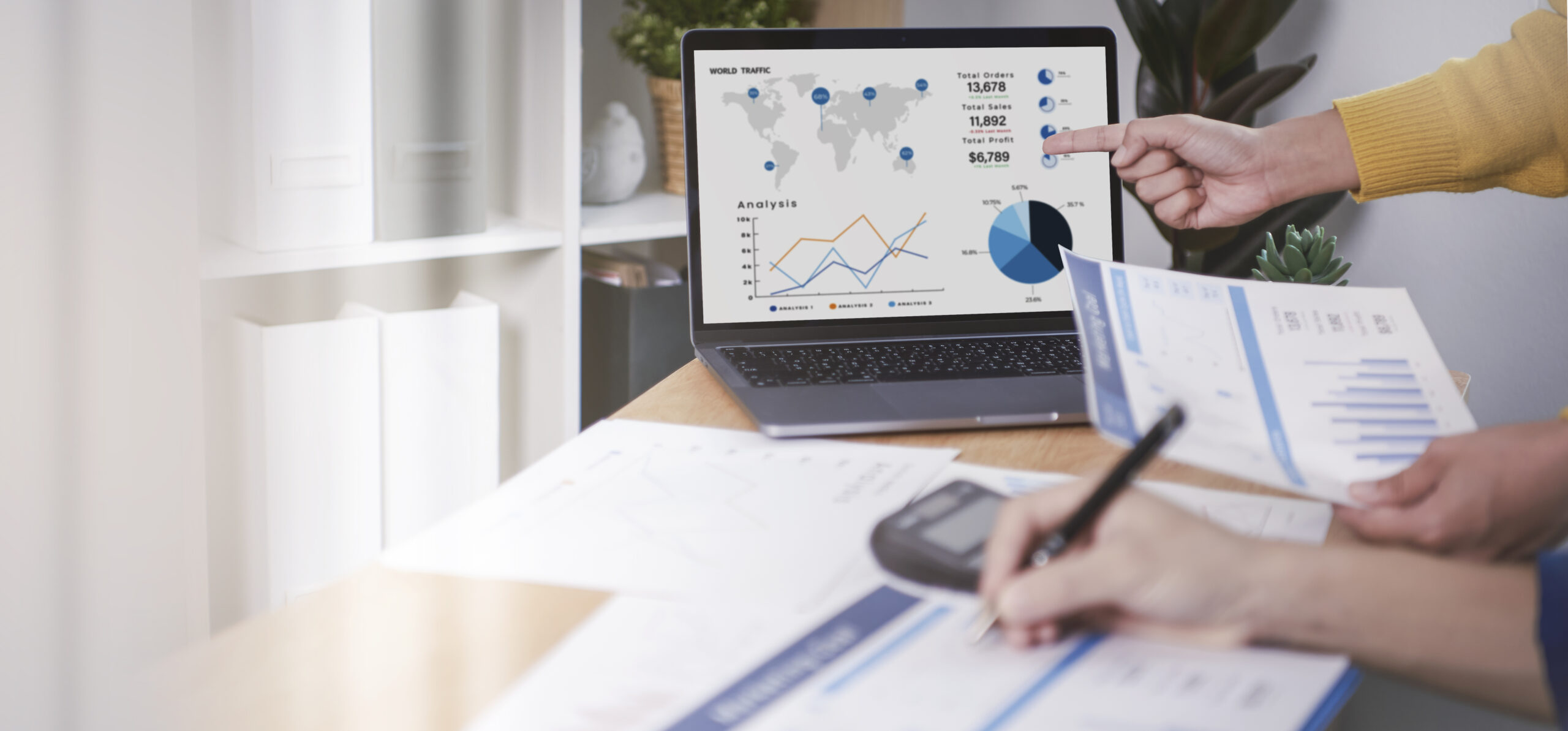 businesspeople-meeting-plan-analysis-graph-company-finance-strat-scaled