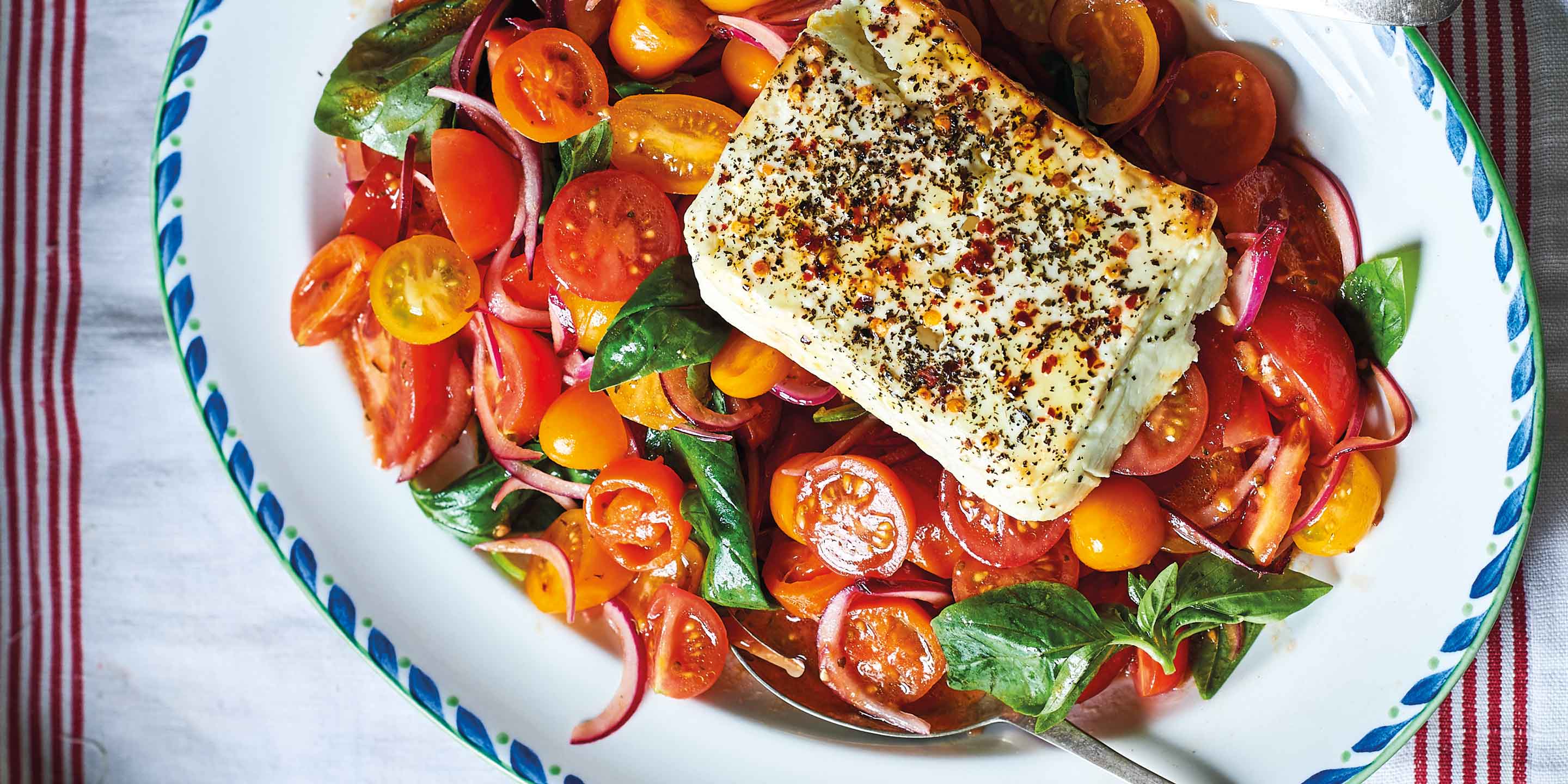 Marinated tomato salad with baked feta and mint