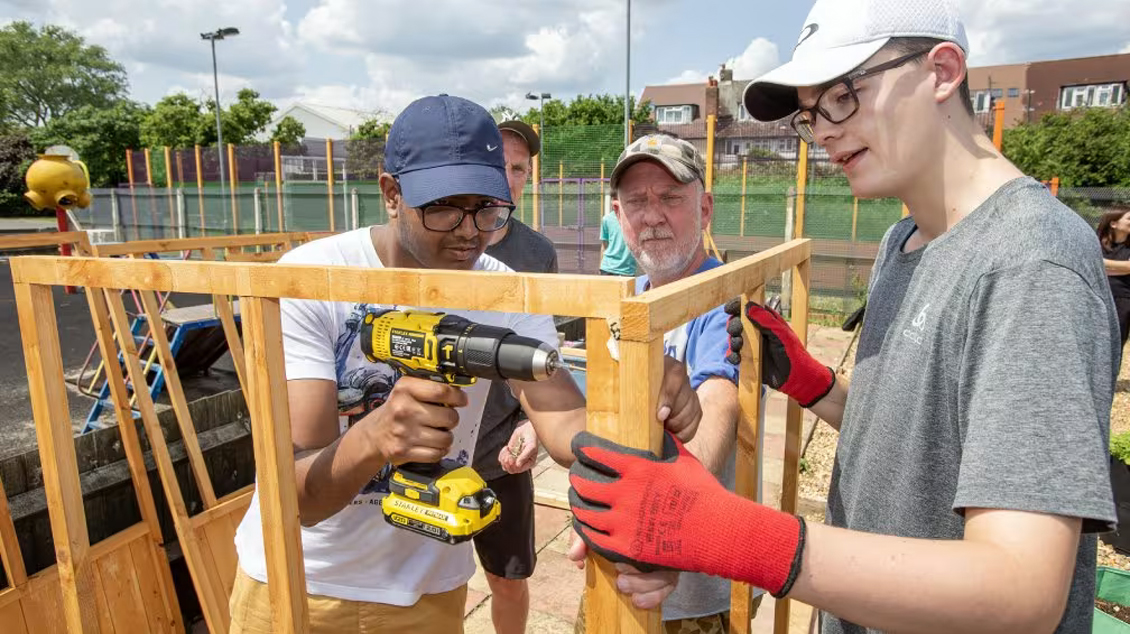 Volunteers carrying out construction work