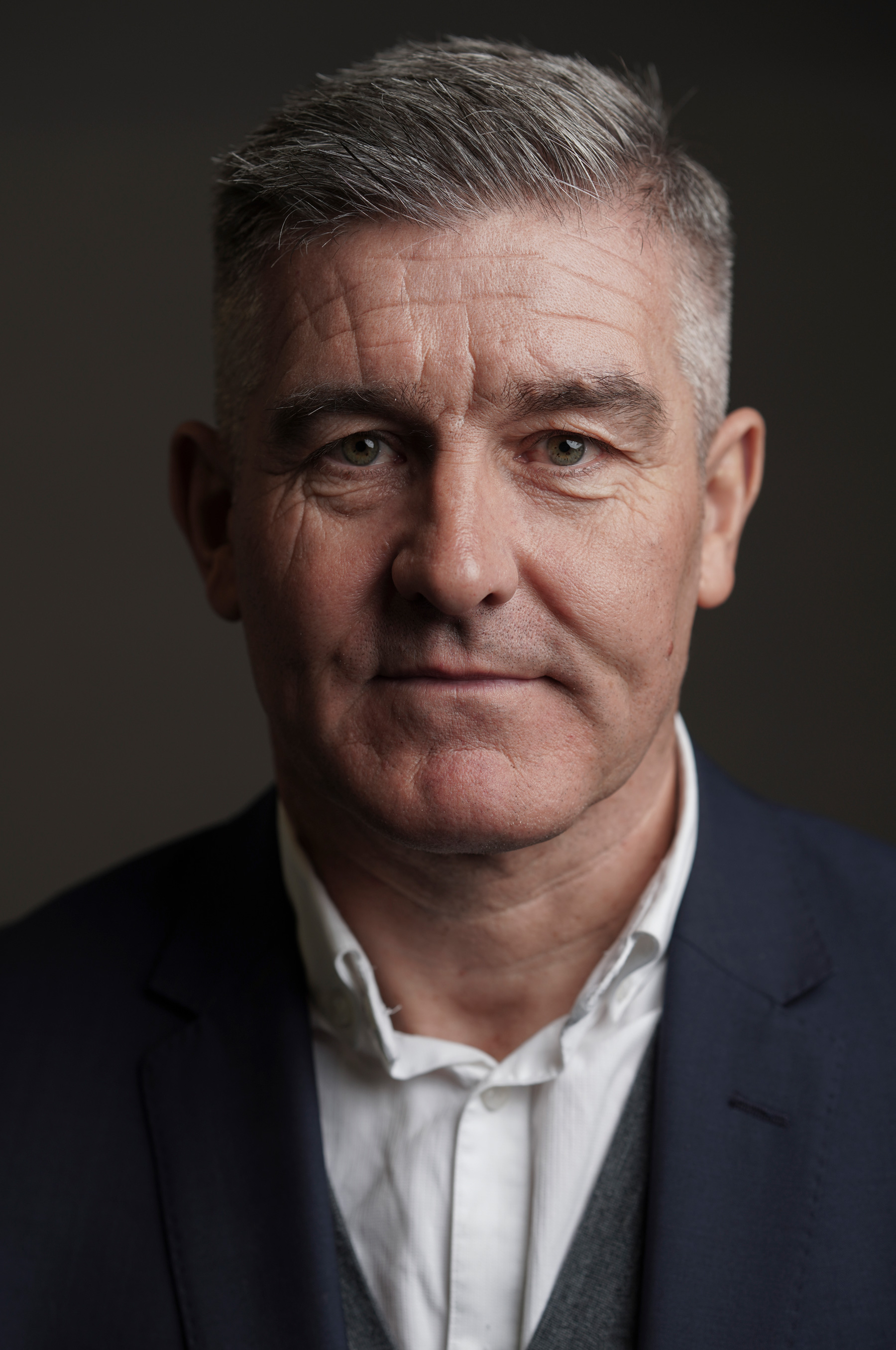 Een portret van sportfotograaf Richard Pelham