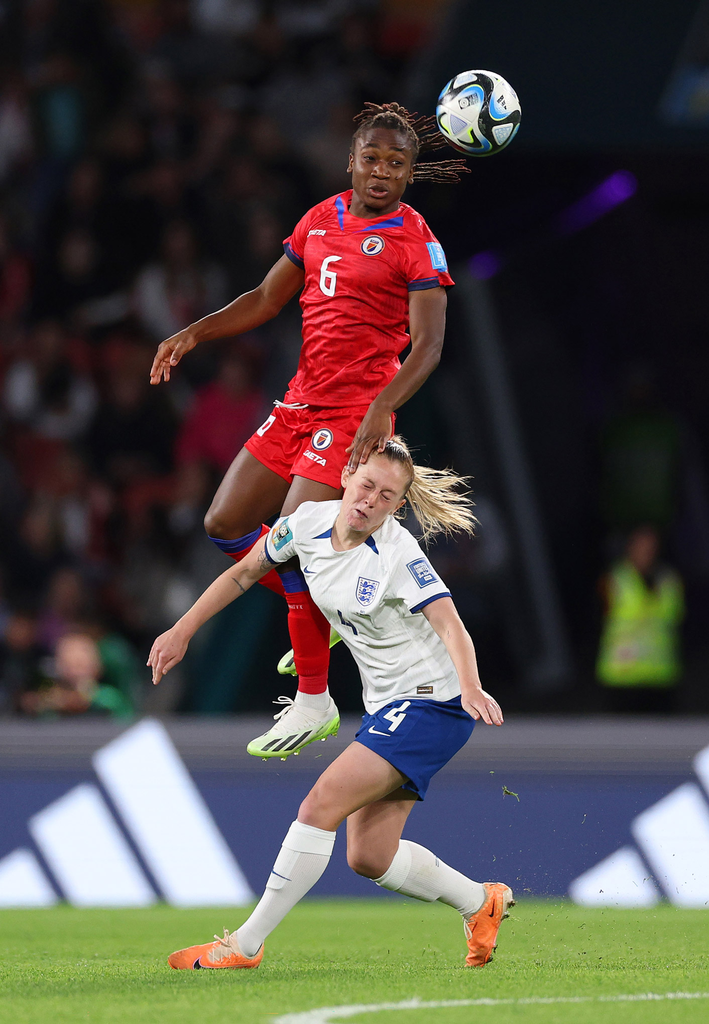 Melchie Dumornay of Haiti jumps over Keira Walsh of England during the FIFA Women's World Cup Australia & New Zealand 2023 Group D match at Brisbane Stadium, Australia, photo by Elsa Garrison with a Canon EOS R3