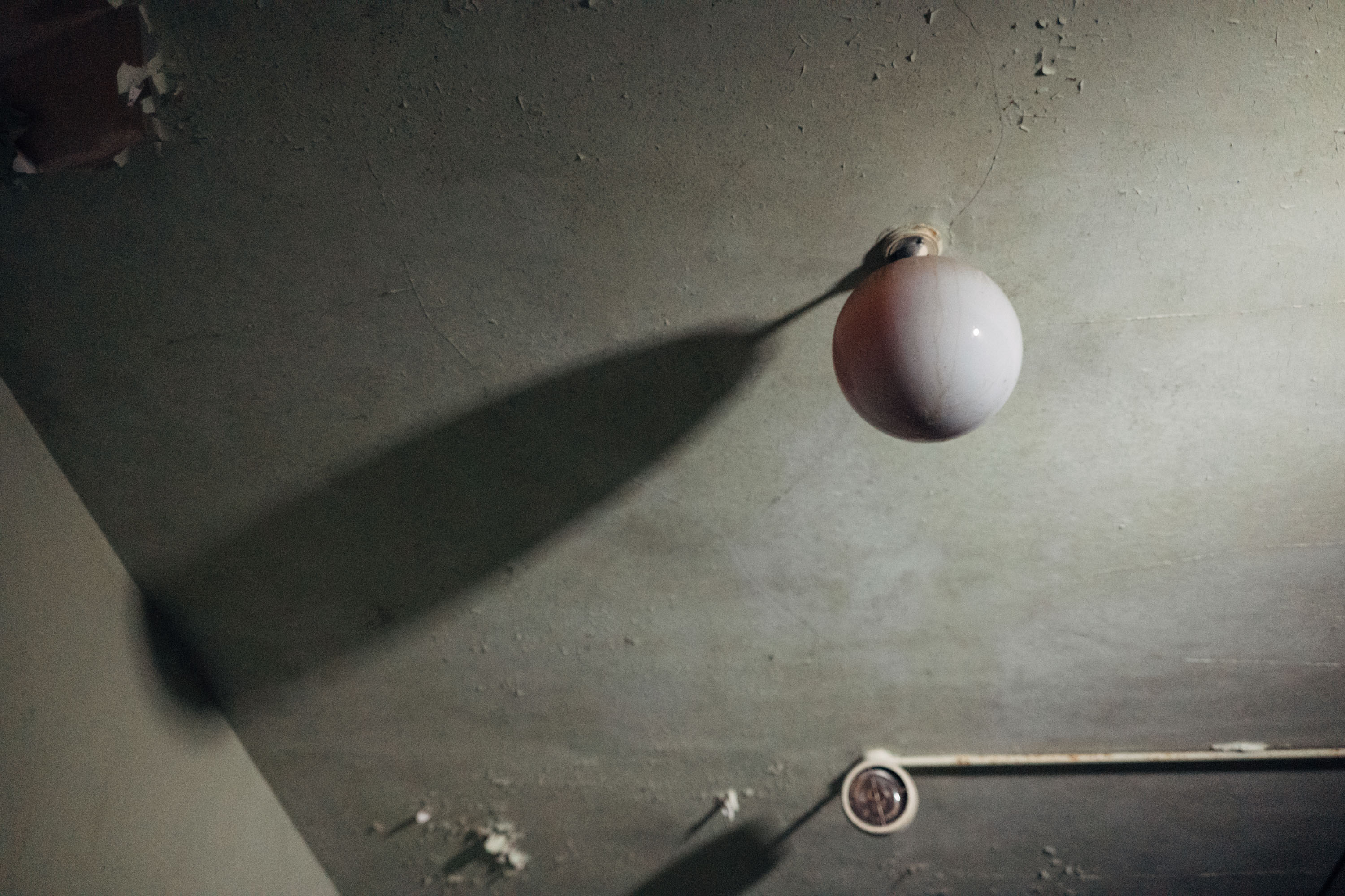 A red and dusty ceiling light 