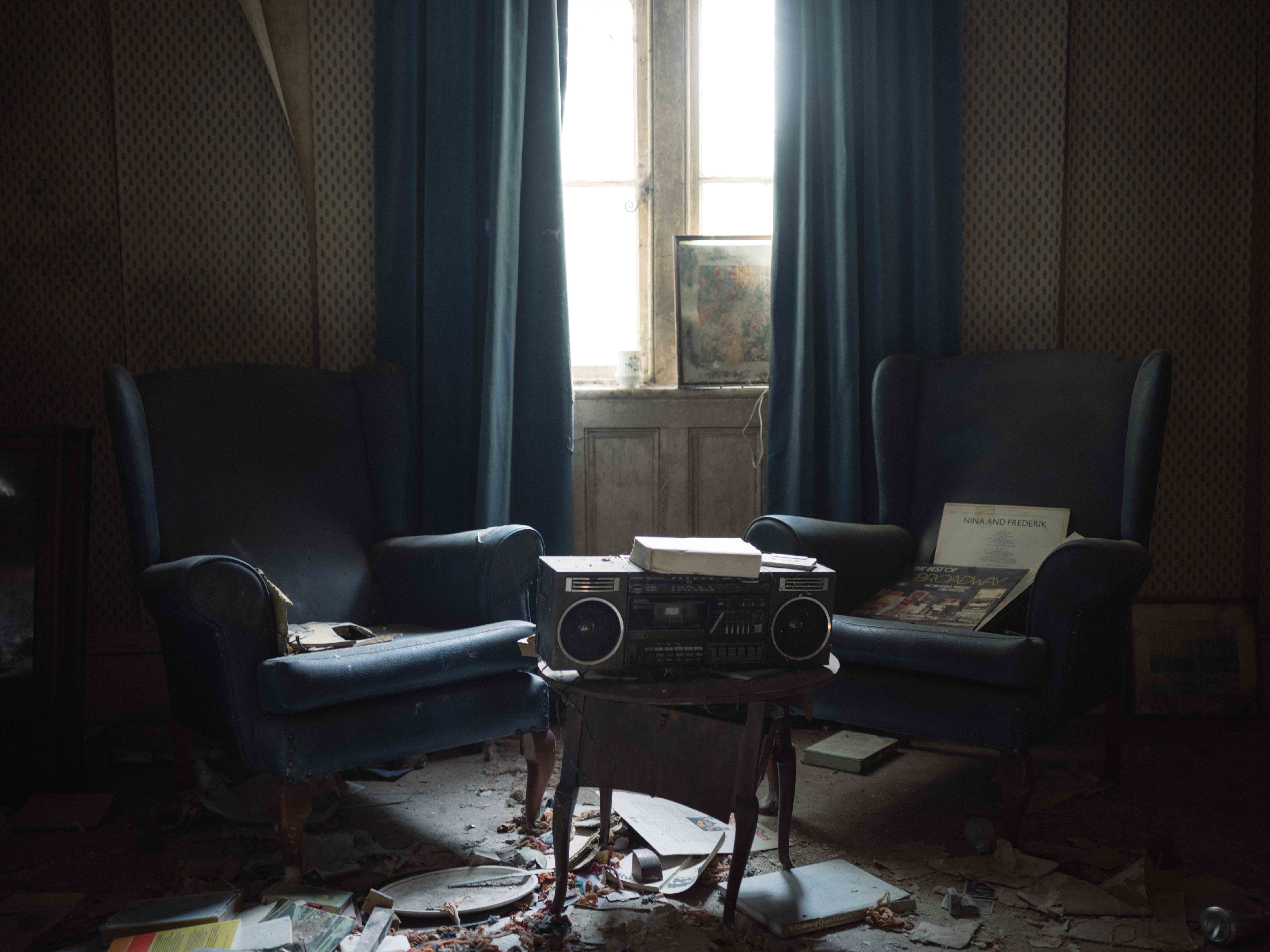 Light through a window at an abandoned house