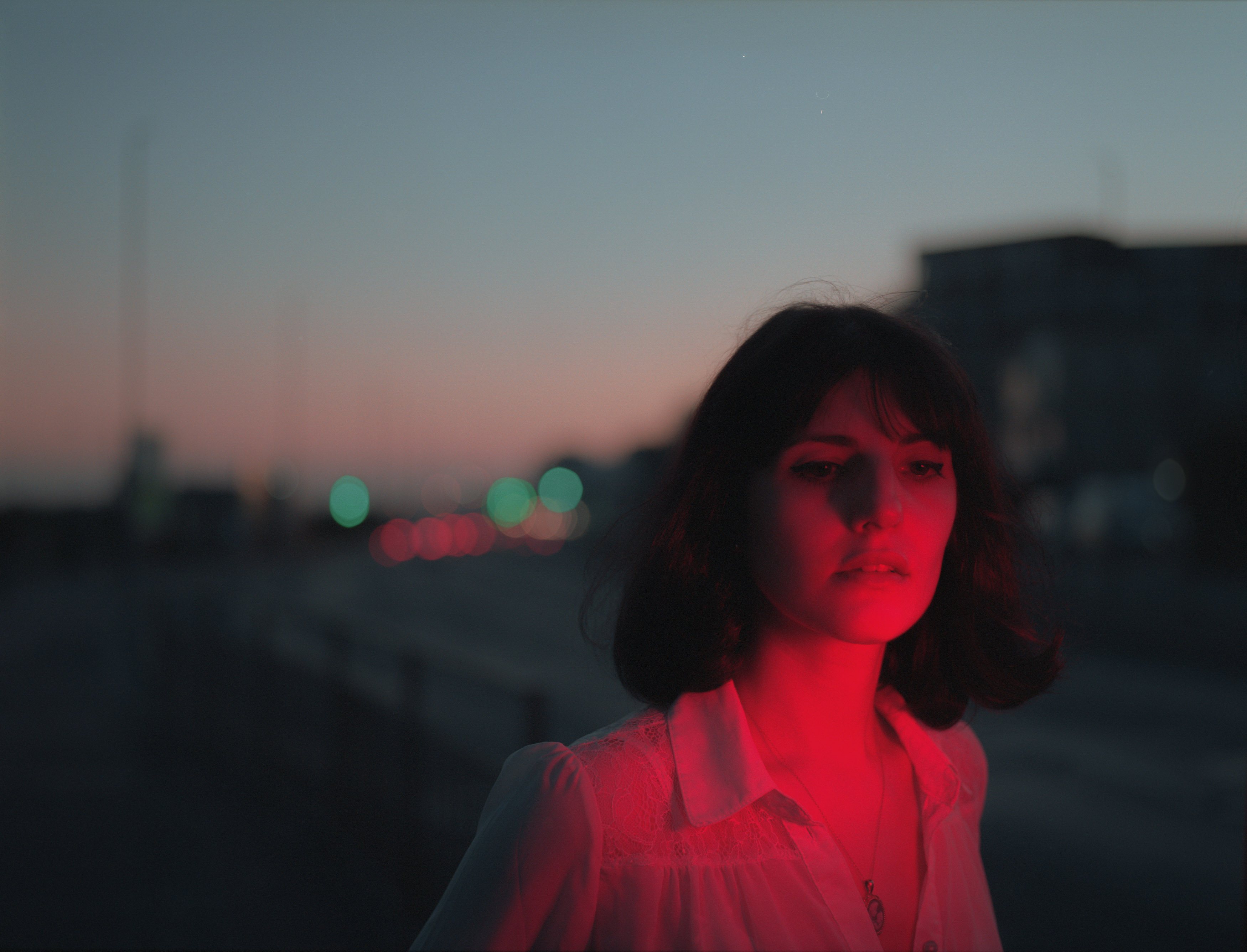 A woman photographed with red light