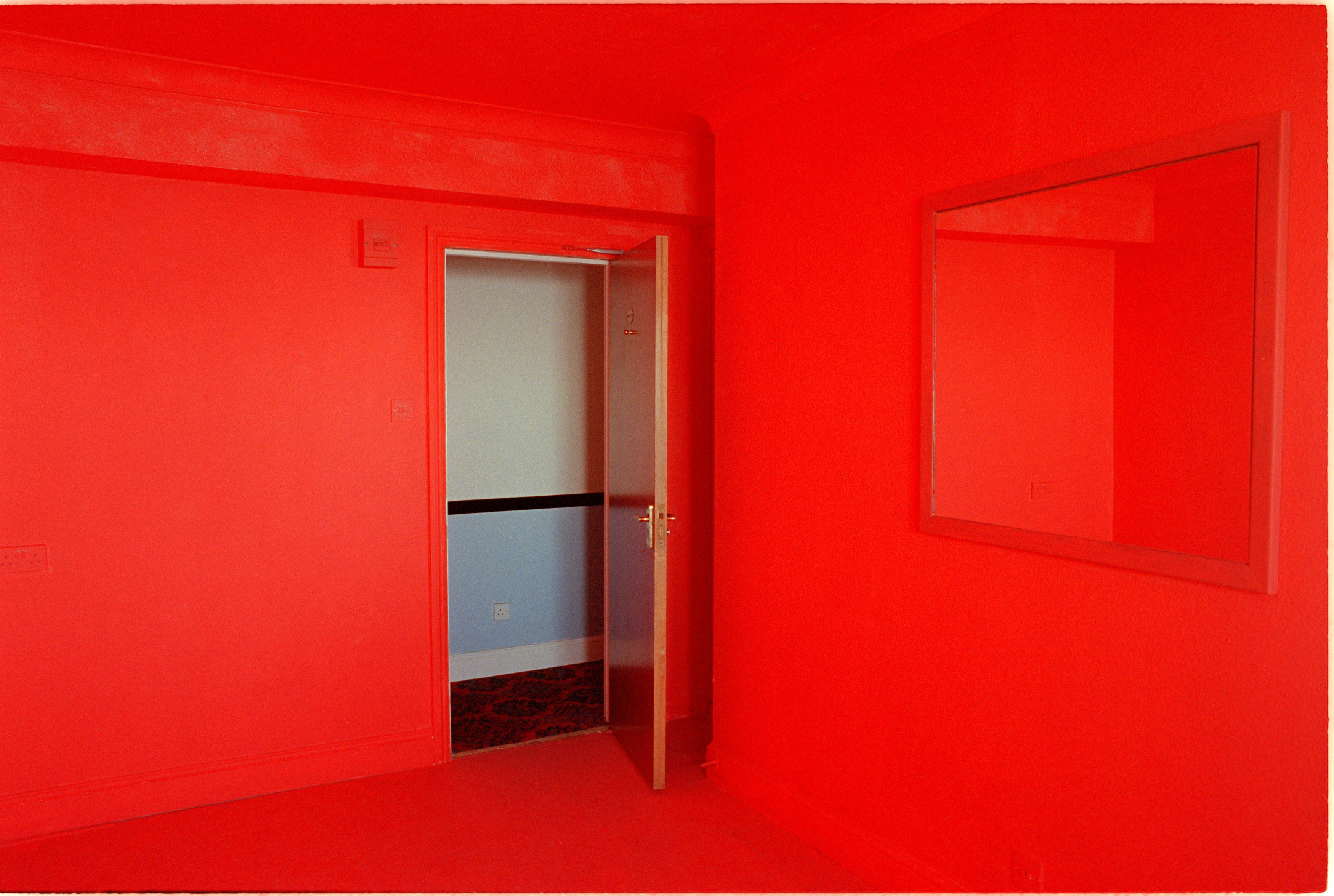 A red room with the door left open