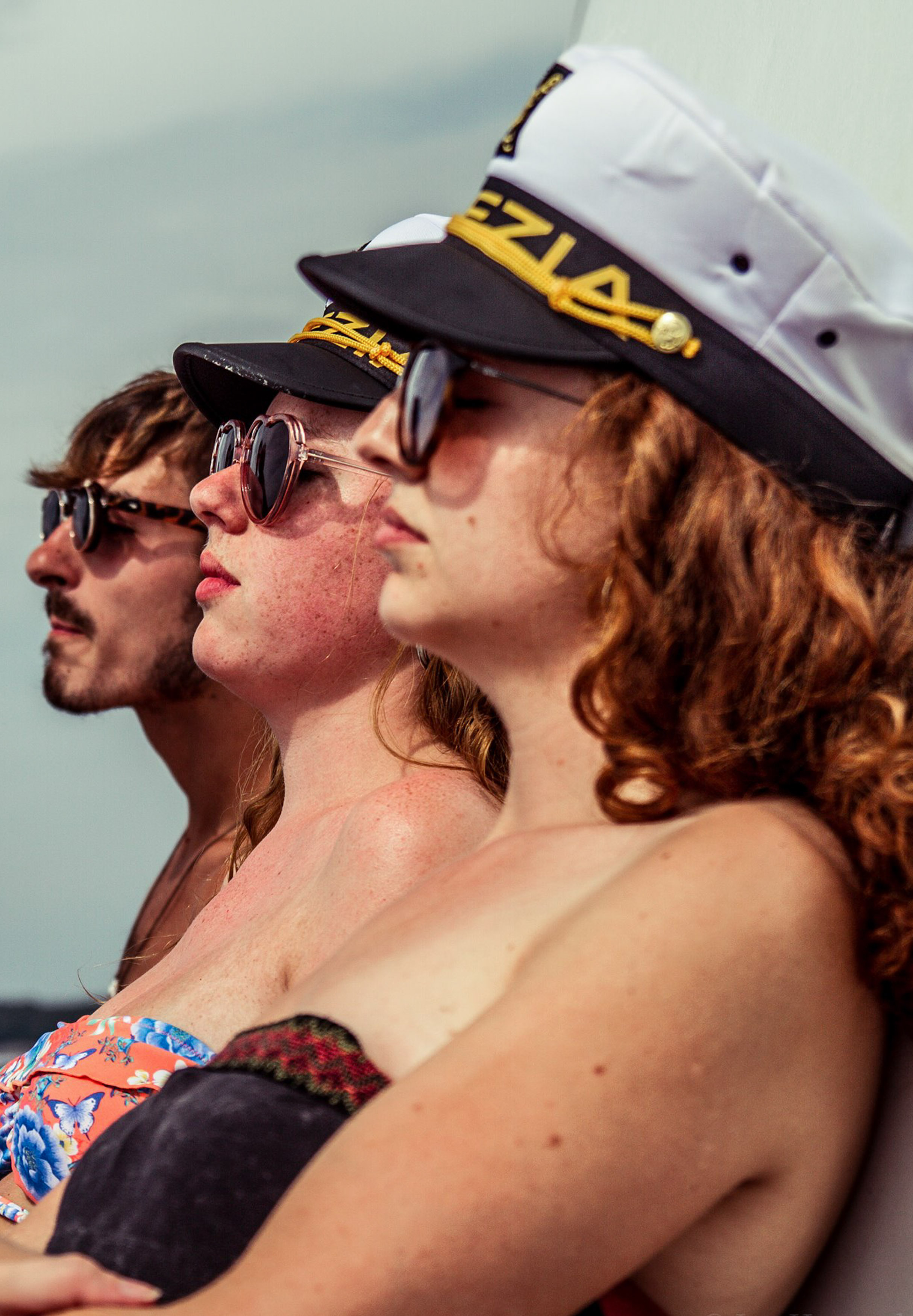 Three people silhouetted