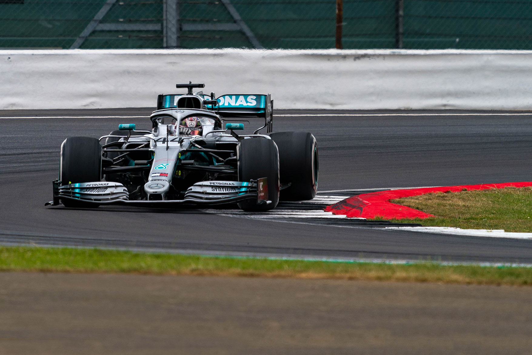 Lewis Hamilton in a Mercedes f1 car 