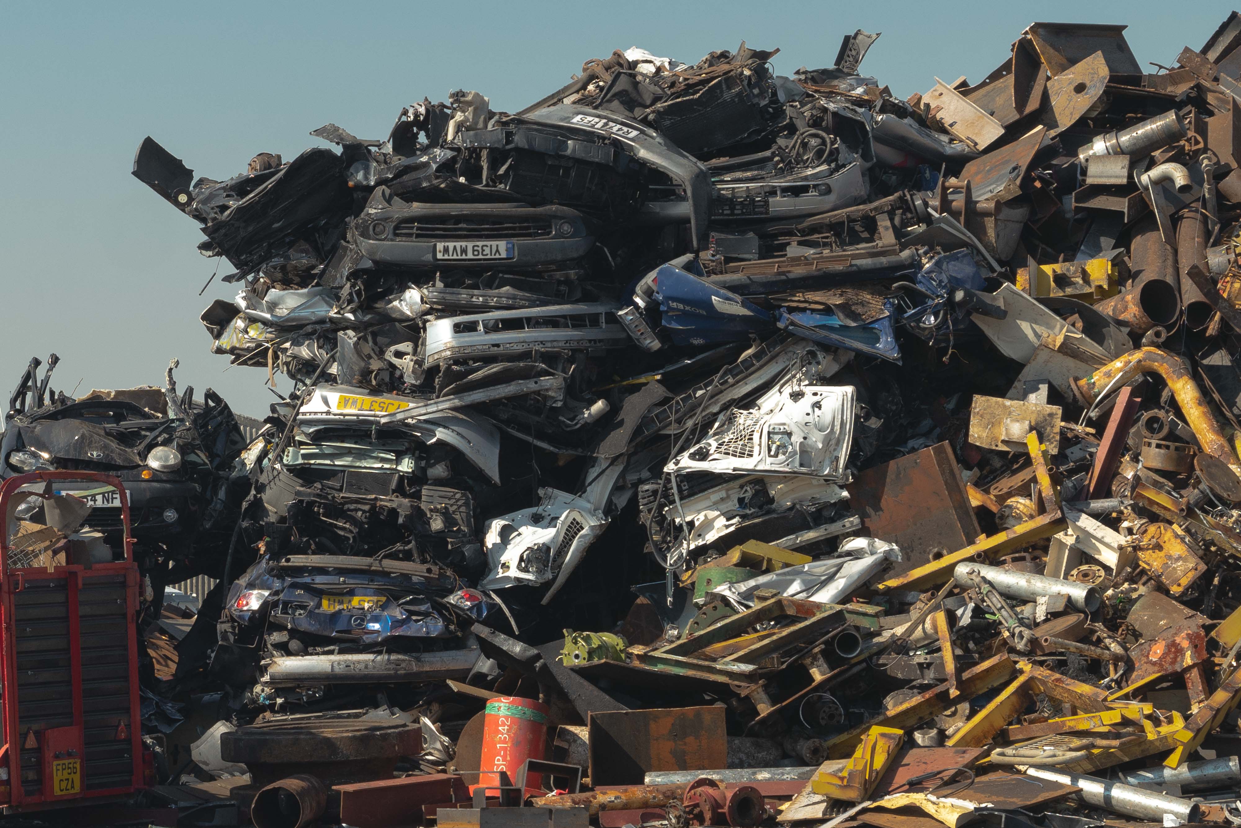 crushed cars but closer