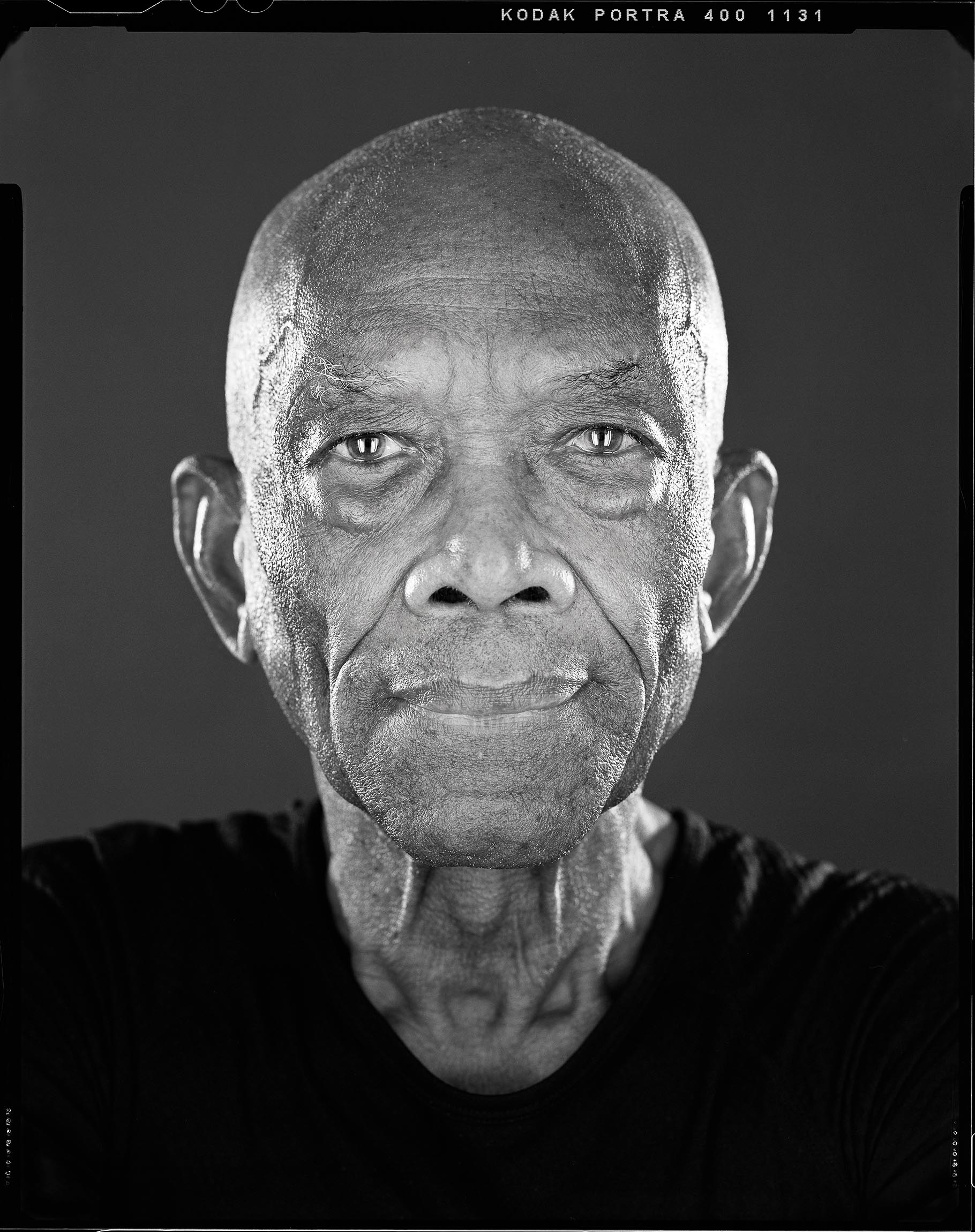 Black-and-white portrait of an elderly man