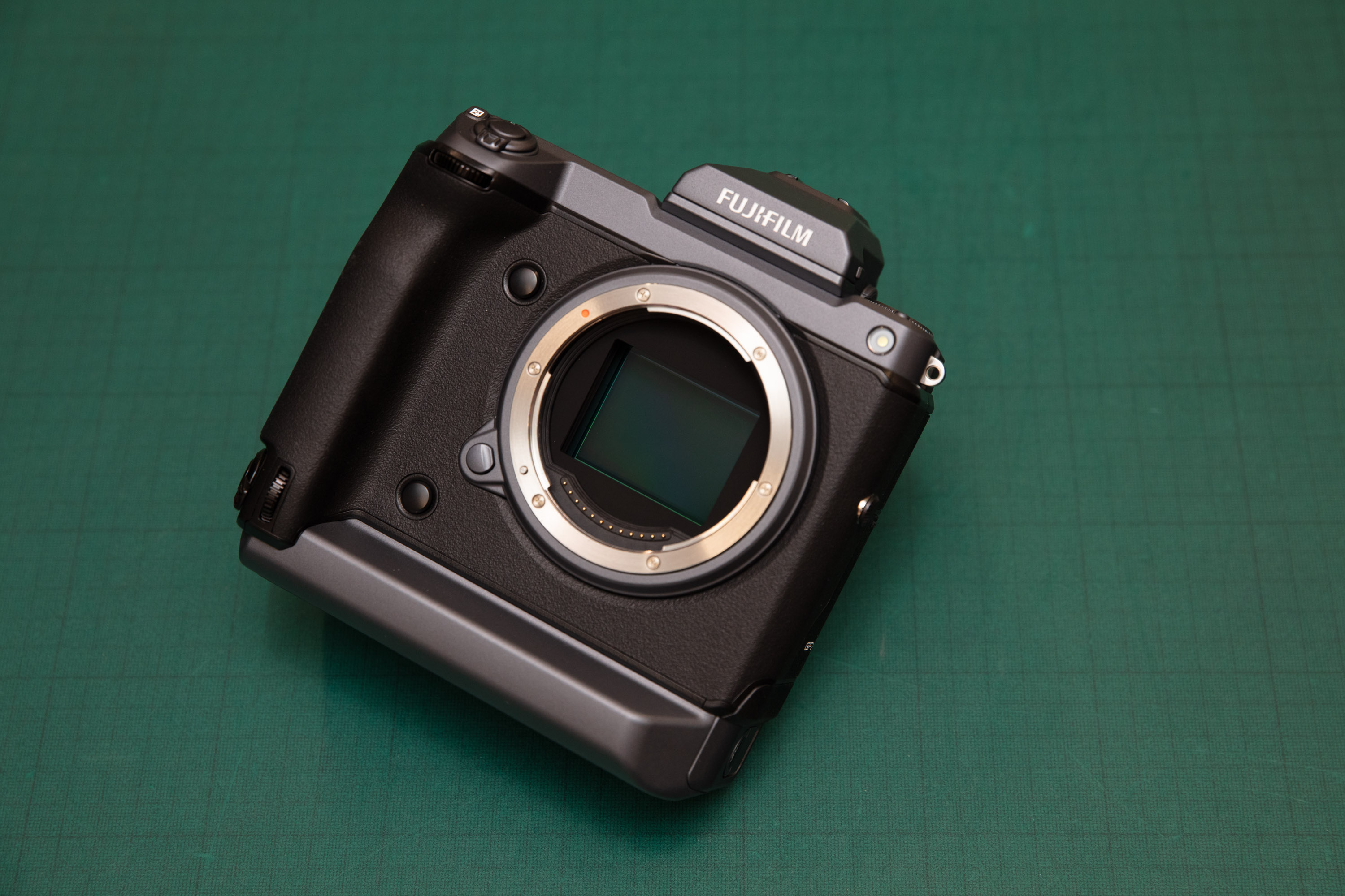Fujifilm GFX100 on green background