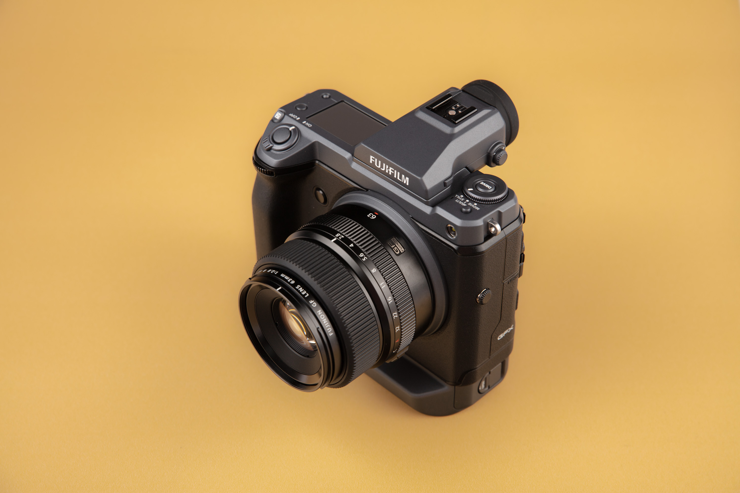 Fujifilm GFX100 on yellow background