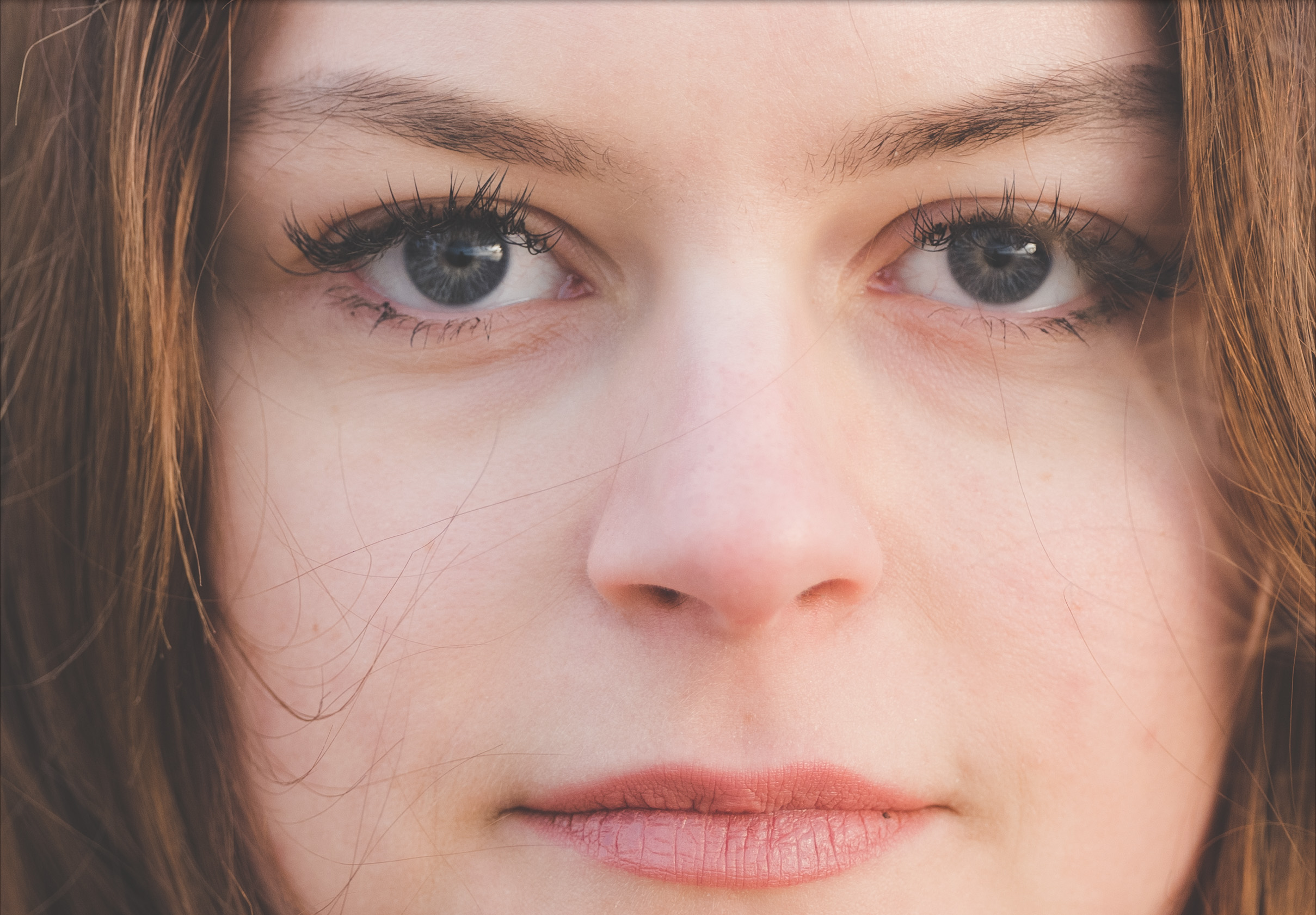 Extreme close-up of a person on the beach. Shot with Fujifilm GFX100.