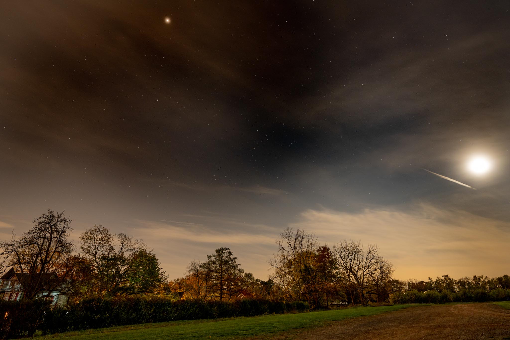 Long exposure of a field and trees. Shot with Sony A7R IV.