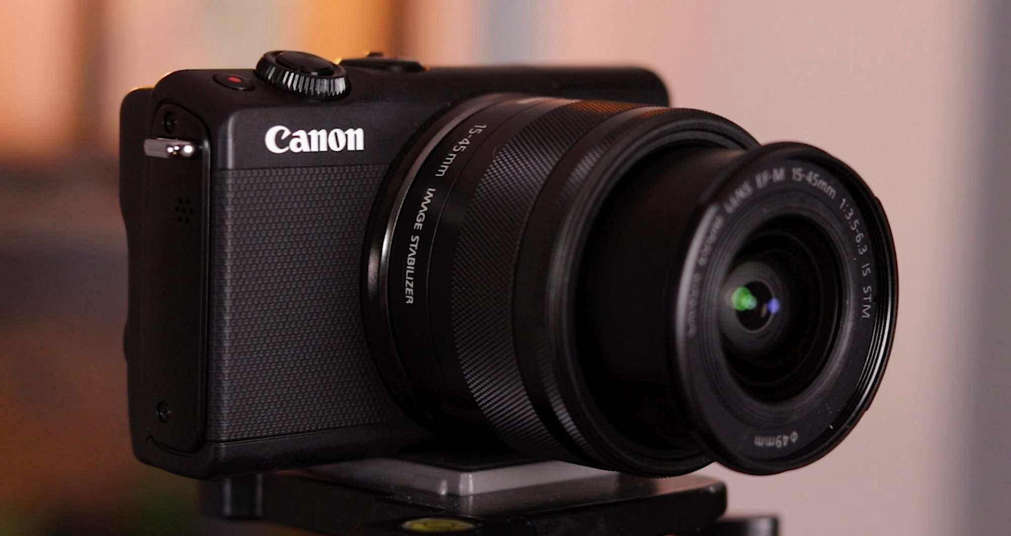 Canon M100
