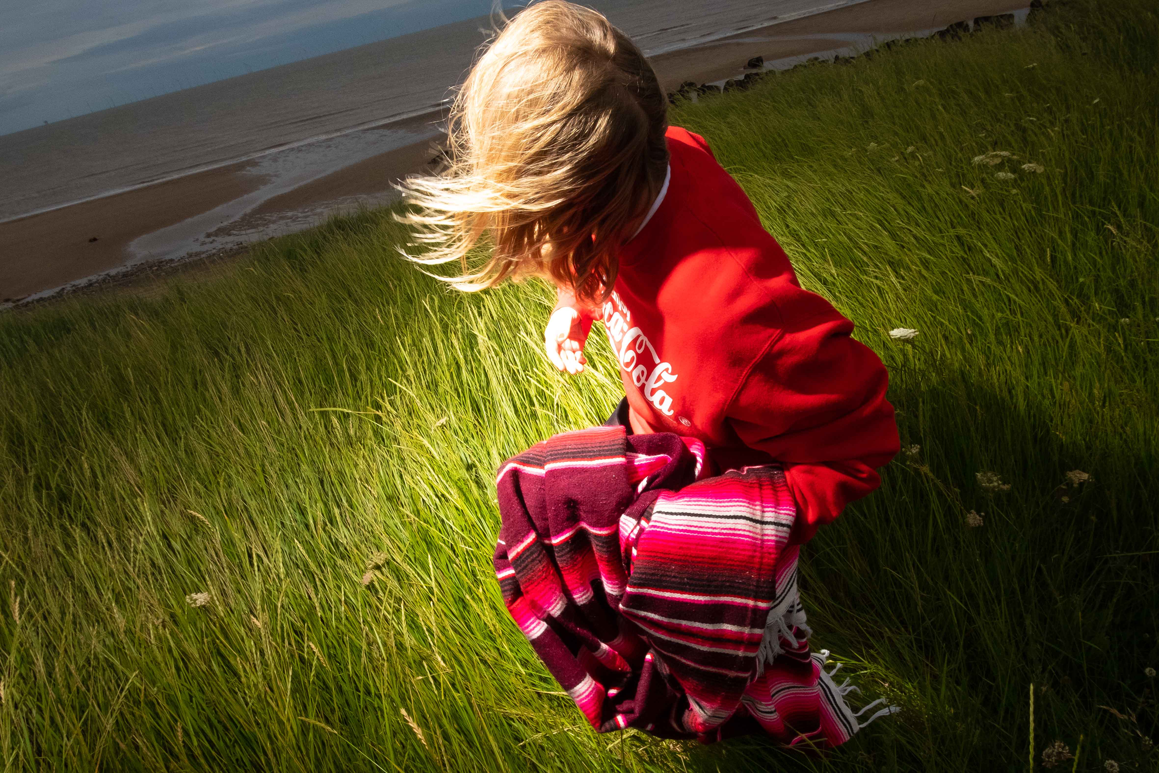 a young boy with blonde hair