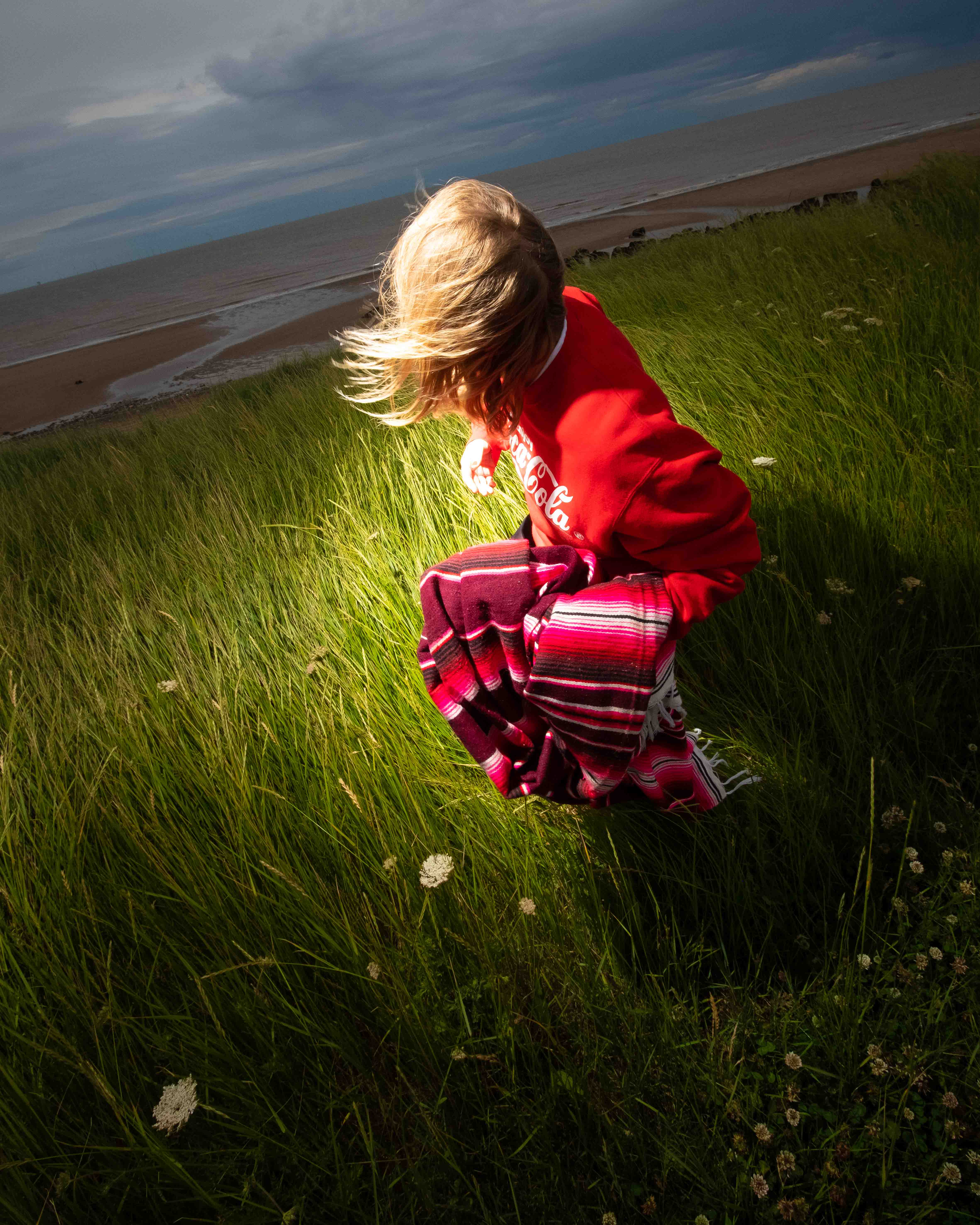 a young boy with blonde hair