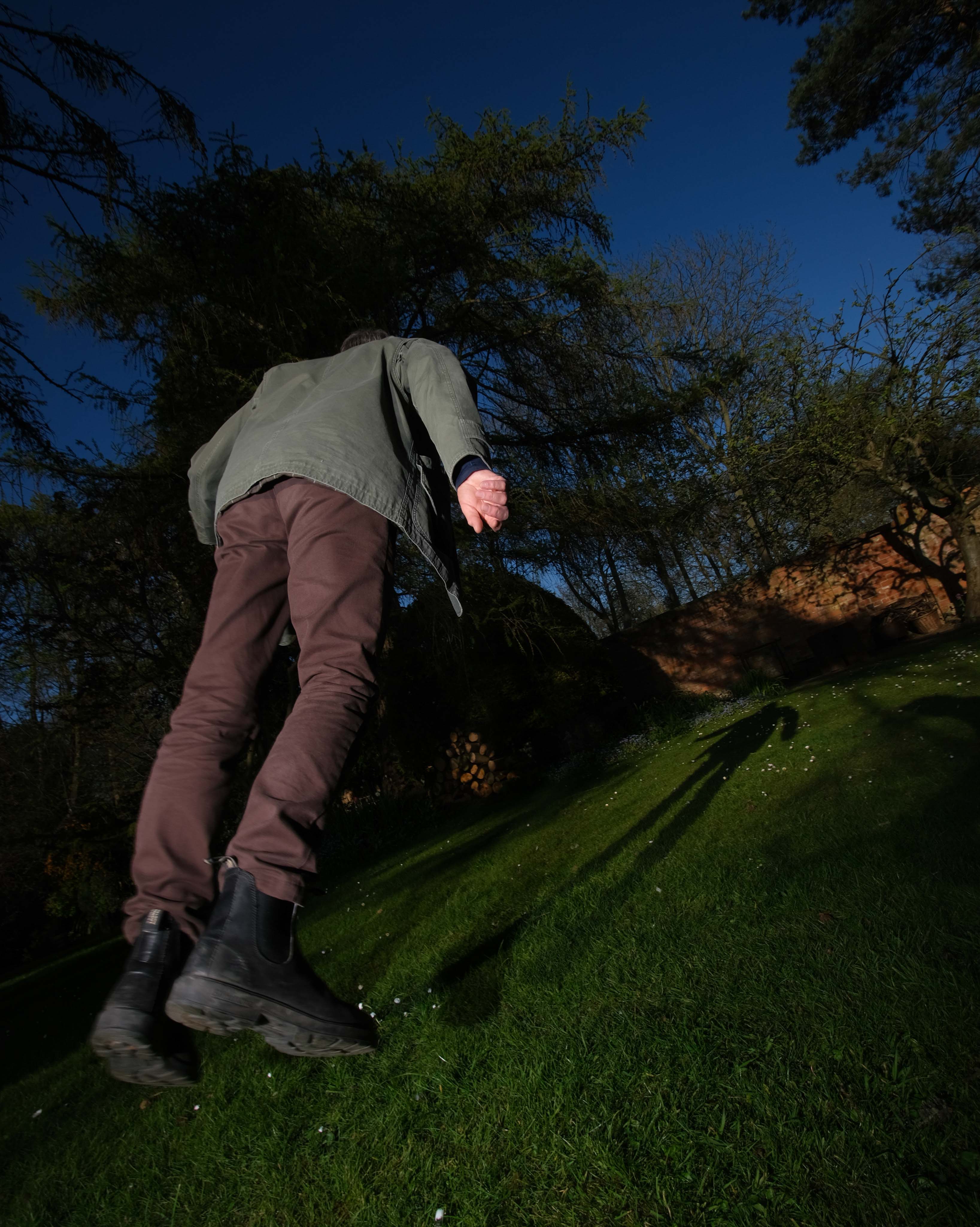 a man tilting over frozen by flash