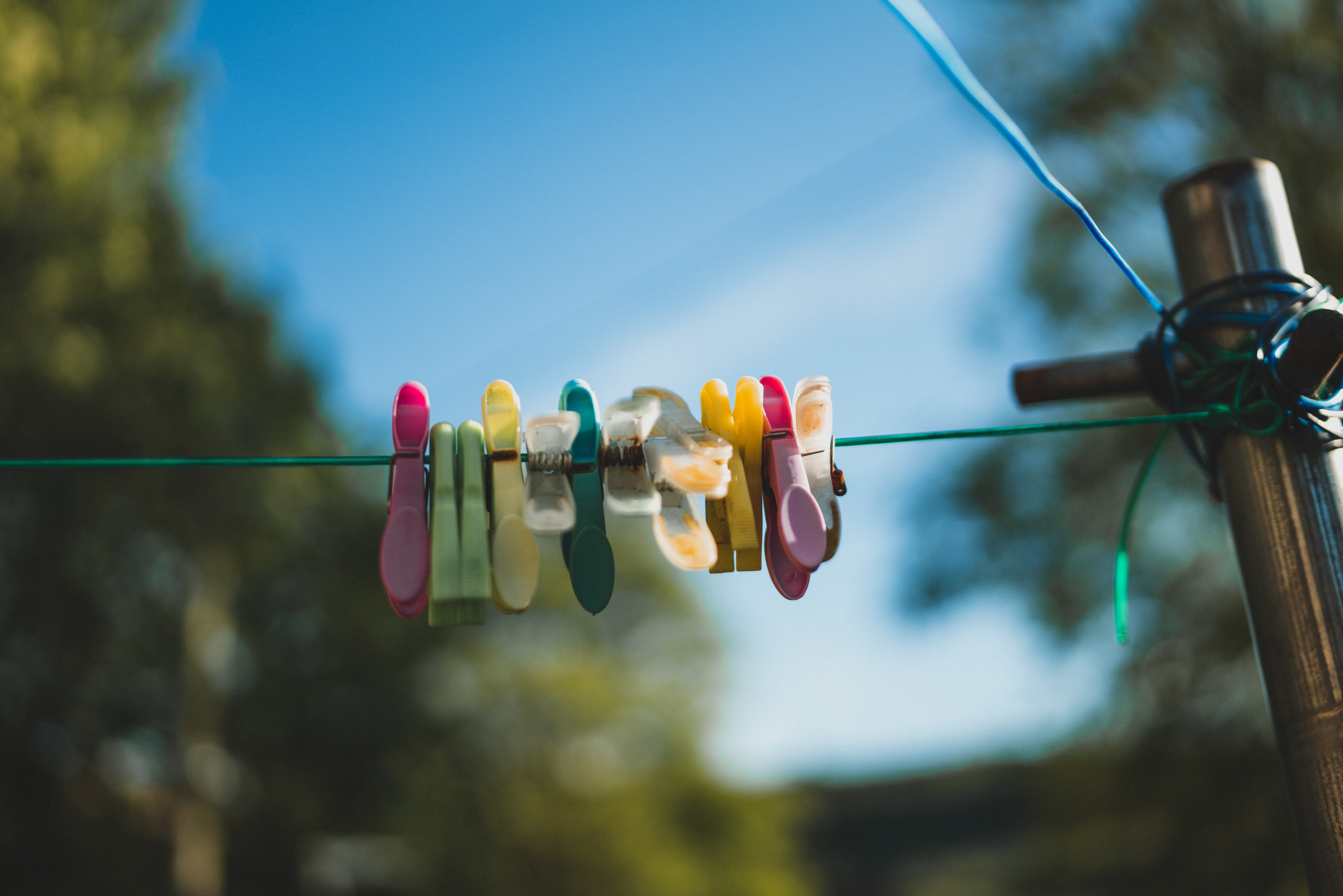 Plastic clothes pegs on a wire, taken by Ian Howorth with Leica SL2 and Sigma 35mm f/1.2 DG DN ART